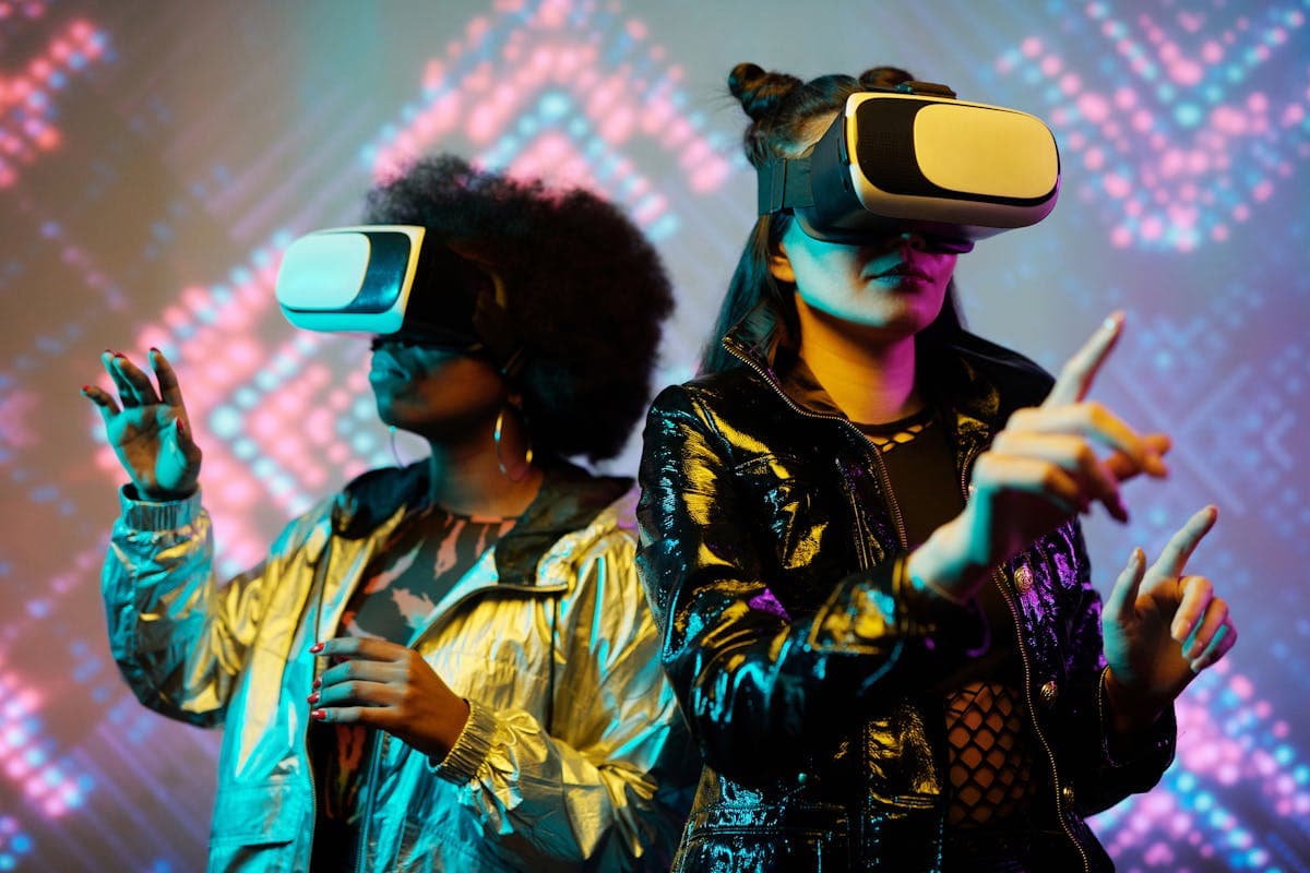 Two players celebrating in VR headsets