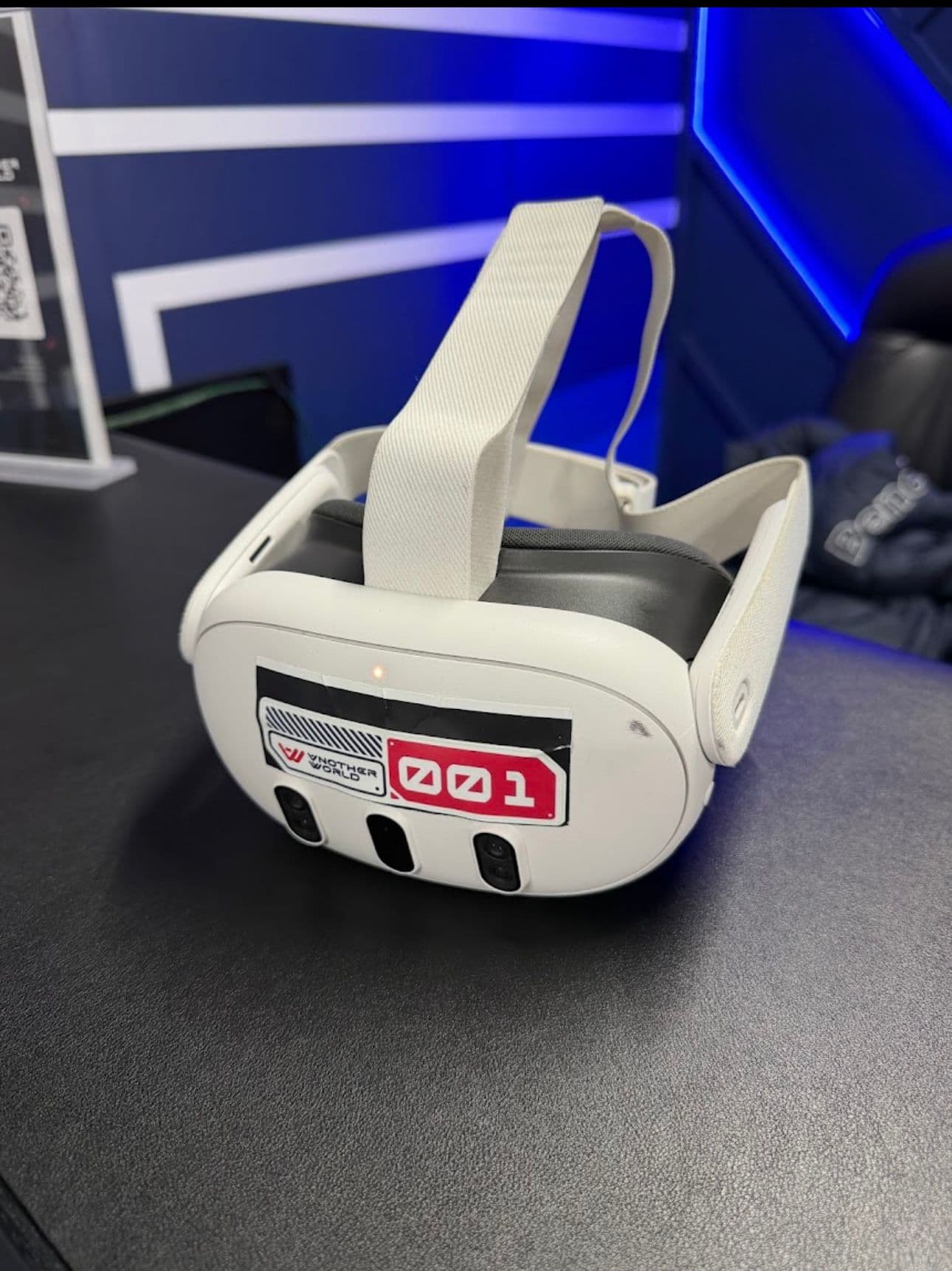 Meta Quest headset with the Another World 001 badge