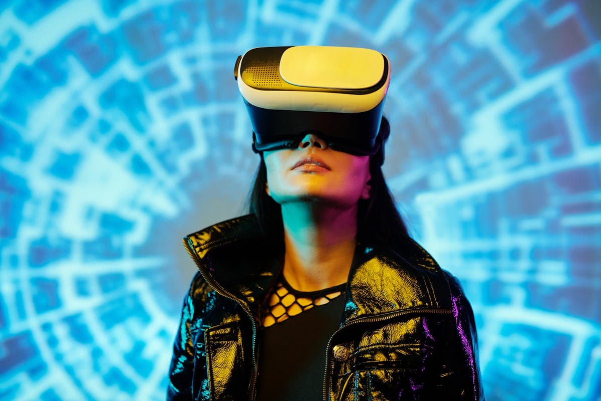 Player in VR headset with cyan geometric backdrop